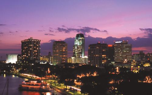 a view of a city skyline at night at St Petersburg Vacation Rentals in St Petersburg