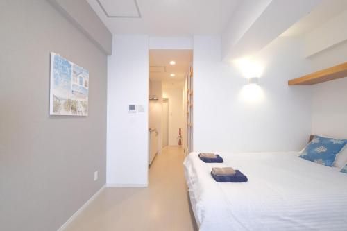Good Life Apartment ( Okinawa ) 객실 침대