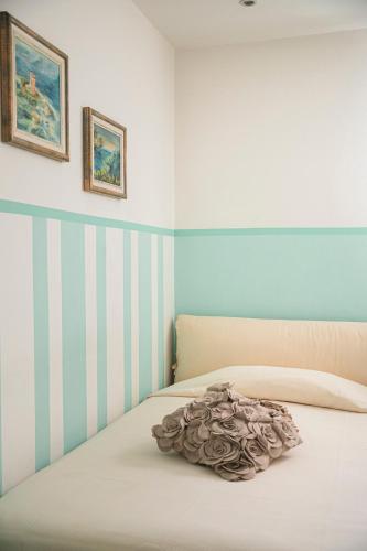 Ένα ή περισσότερα κρεβάτια σε δωμάτιο στο Hotel San Genesio