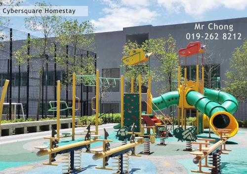 a playground in front of a building at Cybersqaure Studio Suites with Netfilx @10 min walking distance to McD in Cyberjaya