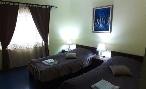 Cama o camas de una habitación en Smeštaj Franica