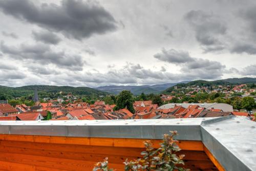 a view of a city from the roof of a building at Heidequartier Harz in Wernigerode