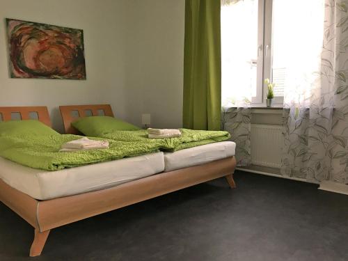 Katil atau katil-katil dalam bilik di Stadtvilla