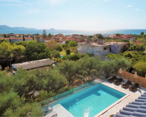 an aerial view of a swimming pool in a villa at Litore Luxury Living in Laganas