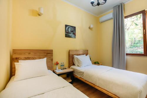 Hotel Chateau Iveriにあるベッド