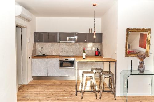 Kuchyň nebo kuchyňský kout v ubytování Apartmán NEWSTALGIE