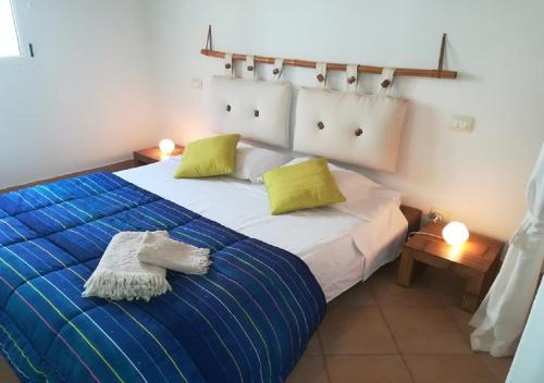 Säng eller sängar i ett rum på Apartments Mistral Estoril Beach