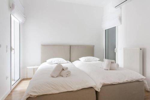 Postel nebo postele na pokoji v ubytování Luxury 2 bedroom 2 bathroom flat in Kolonaki !