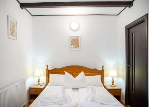 Postel nebo postele na pokoji v ubytování VILLA GHERMAN