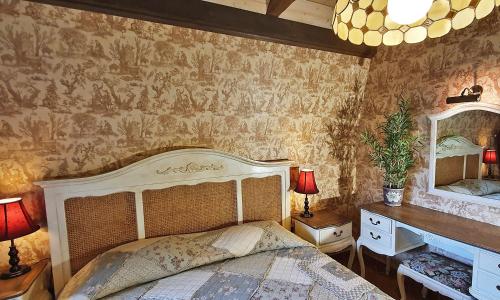 Postel nebo postele na pokoji v ubytování Boutique Vila Artemide