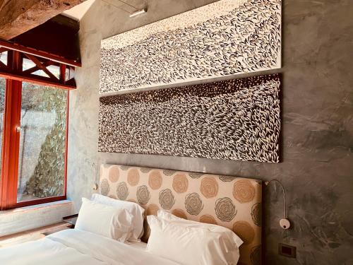 Un ou plusieurs lits dans un hébergement de l'établissement Galleria Vik Milano - Townhouse Galleria - Small Luxury Hotels of the World