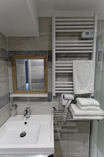 Ένα μπάνιο στο Appart'Hôtel Sainte Trinité