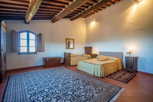 A bed or beds in a room at Il Casone