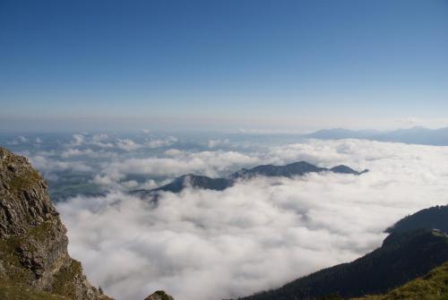 a view of clouds from the top of a mountain at Gasthof Löwen in Pfronten