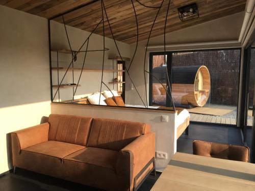 Un lugar para sentarse en Beau Réveil nature & wellness - gite 2