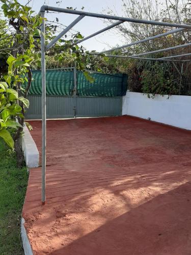 a pergola over a red brick patio at CASA RURAL LIMÓN Y SOL in Sauzal