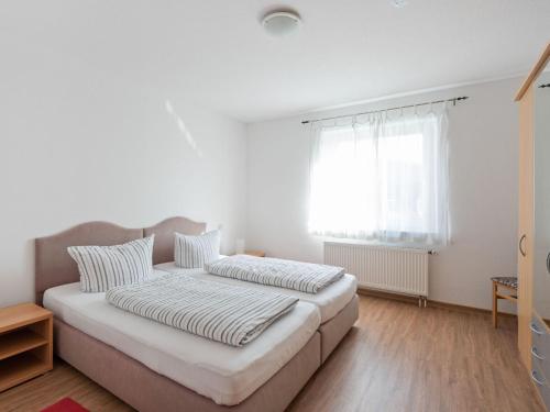 Katil atau katil-katil dalam bilik di Spa Apartment, Bad Dürrheim