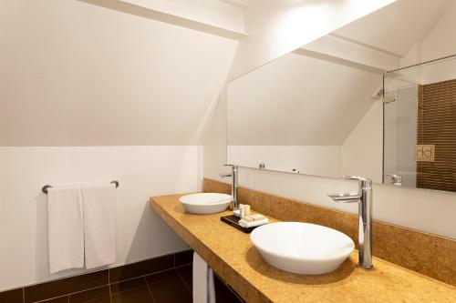 Koupelna v ubytování Hotel bh La Quinta