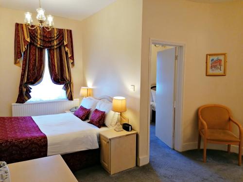Katil atau katil-katil dalam bilik di The Gordon House Hotel