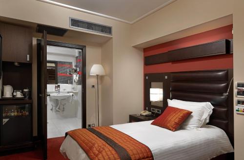 Letto o letti in una camera di Crowne Plaza Athens City Centre by IHG
