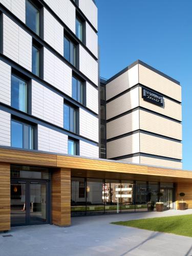a rendering of the front of a building at Staybridge Suites Newcastle by IHG in Newcastle upon Tyne