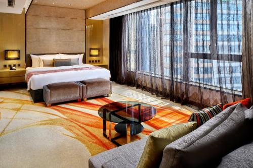 Postel nebo postele na pokoji v ubytování Crowne Plaza Hong Kong Kowloon East by IHG