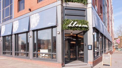 a store front of a building with a sign on it at Crowne Plaza London Kings Cross by IHG in London