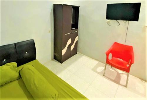 Μια τηλεόραση ή/και κέντρο ψυχαγωγίας στο Radja Guest House