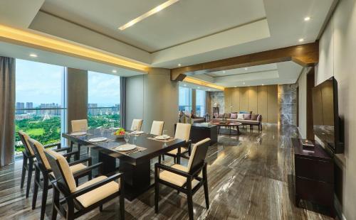 a dining room with a table and chairs at Crowne Plaza Nanning City Center by IHG in Nanning