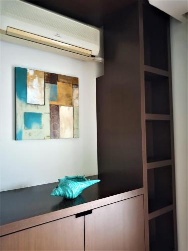 a kitchen with a blue fish on a counter at Lilioum Apartment in Thessaloniki