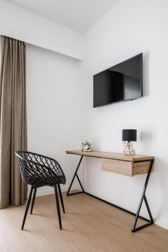 TV a/nebo společenská místnost v ubytování Hotel Torá