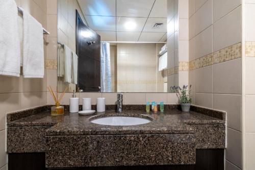 Ванная комната в The Smart Concierge - Bay Central