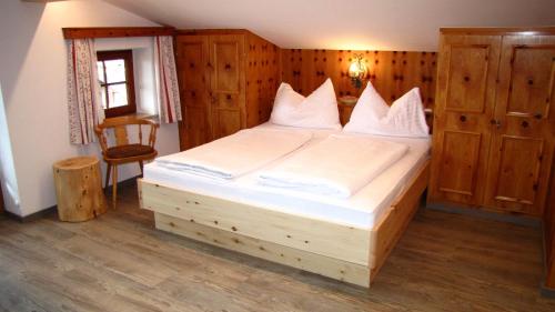 Ein Bett oder Betten in einem Zimmer der Unterkunft Apartments Röck
