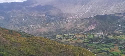 an aerial view of a valley in the mountains at VILA DISHA in Tirana
