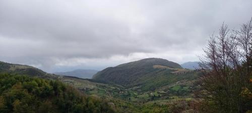 a view of a valley in the mountains at VILA DISHA in Tirana