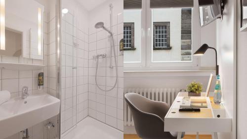 Ванная комната в Beethoven Hotel Dreesen - furnished by BoConcept