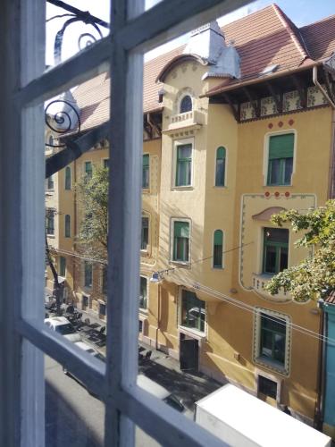 a view of a building from a window at Spiegel Center in Oradea