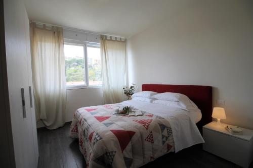 Katil atau katil-katil dalam bilik di Residence Felice