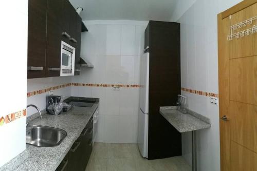Kuchyňa alebo kuchynka v ubytovaní Apartamento Ático Aviles