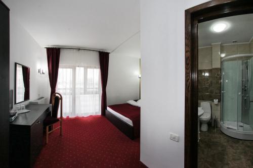 Koupelna v ubytování Hotel Rebis