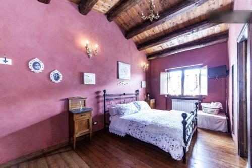 Postelja oz. postelje v sobi nastanitve Al Vecchio Fontanile B&B