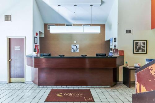 a view of a waiting room with a counter at Sleep Inn University in Tallahassee