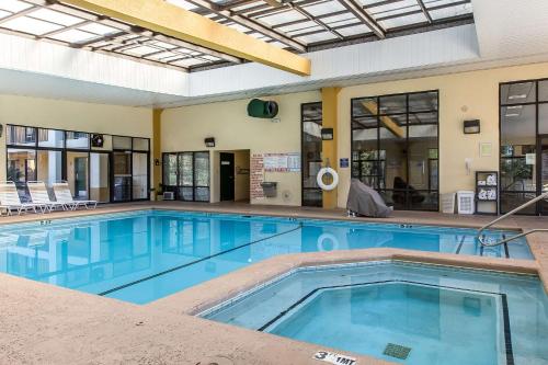 a large swimming pool in a building at Quality Inn Perry - National Fairgrounds Area in Perry