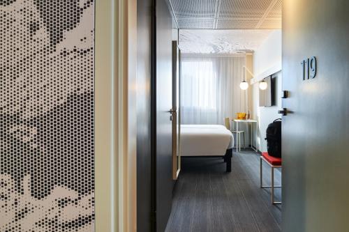 Katil atau katil-katil dalam bilik di Ibis Montlhery Paris Sud