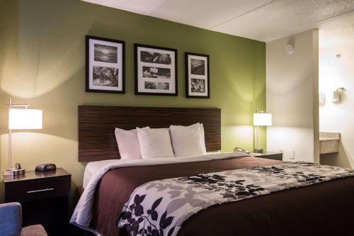 Ένα ή περισσότερα κρεβάτια σε δωμάτιο στο Sleep Inn Atlanta Airport