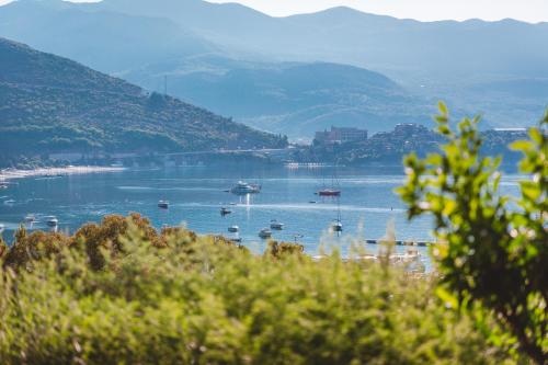 a view of a body of water with boats in it at Boutique Hotel Vissi d'Arte in Budva