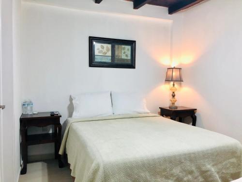 Кровать или кровати в номере Hotel Carretas by Rotamundos