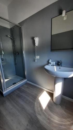 Un baño de Bergamo GuestHouse - Self Check-in