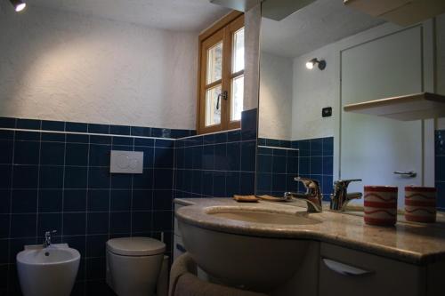 Koupelna v ubytování Rifugio Dalco