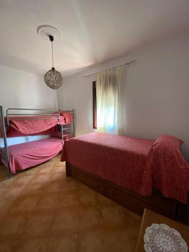 Cama o camas de una habitación en CASA RURAL SALVI